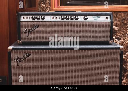 Rome, Italy, february 2nd 2020. Fender stage bass amplifier music equipment logo knobs and speaker grid front view Stock Photo