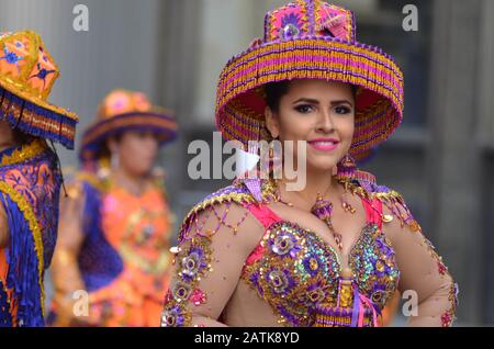 A participant is seen wearing ethnic costume and marching during the annual Hispanic day parade on October 13, 2019. Stock Photo