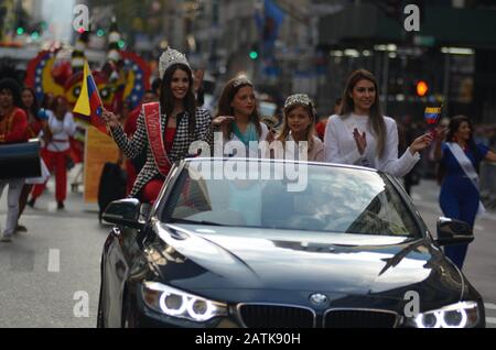 Participants seen dancing along Madison Avenue during the annual Hispanic day parade in New York City on October 13, 2019. Stock Photo