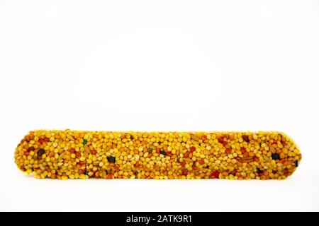 Treat Sticks for Budgerigars with Honey on isolated white background Stock Photo