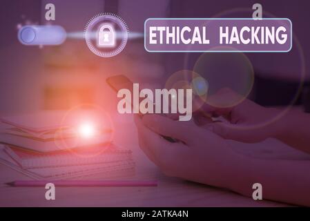 Handwriting text writing Ethical Hacking. Conceptual photo act of locating weaknesses and vulnerabilities of computer Stock Photo