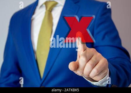 business man touching rejection button on virtual screen Stock Photo