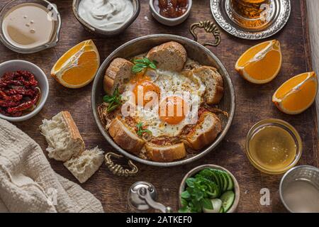 Close view of fried eggs in a traditional turkish pan Stock Photo