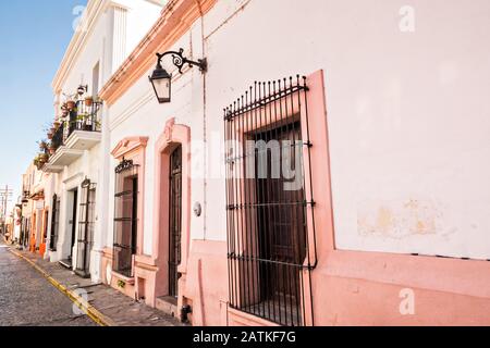 Colorful Spanish Colonial style buildings and cobblestone streets in the Barrio Antiguo or Spanish Quarter neighborhood adjacent to the Macroplaza Grand Plaza in Monterrey, Nuevo Leon, Mexico. Stock Photo