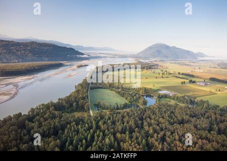 High angle view of Fraser River, forest and farms near Mission, B.C. Stock Photo