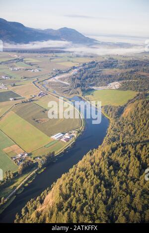 Aerial view of farms and Nicomen Slough near Mission, B.C. Stock Photo