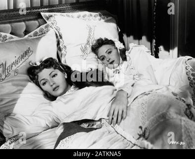 Lana Turner and Donna Reed in the film, 'Green Dolphin Street' (1947) MGM / Cinema Legacy Collection  File Reference # 33962-118THA Stock Photo