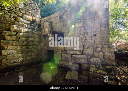 Butrint, Albania - August 05, 2014. Lions gate in summer with strong lens flare effect Stock Photo