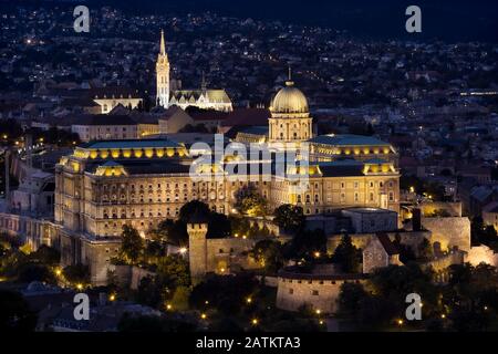 A night view of Buda Castle Royal Palace on the southern tip of Castle Hill int the Buda side of Budapest, Hungary. A UNESCO World Heritage Site. Stock Photo