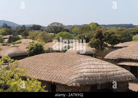 Seongeup Folk Village is located on Jeju island in South Korea. It is traditional straw hut houses that are far away from civilization. Stock Photo