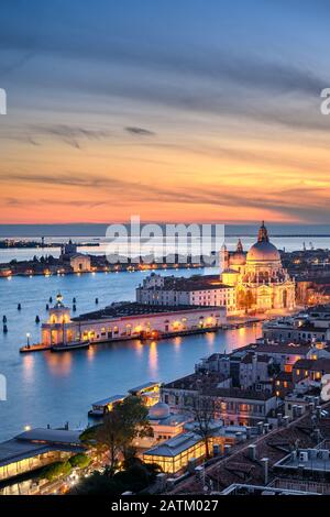 Aerial sunset view of Basilica Santa Maria della Salute night in Venice, Italy Stock Photo