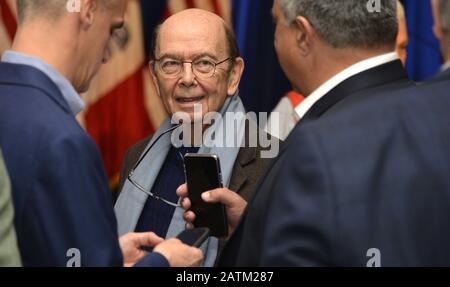 Des Moines, United States. 03rd Feb, 2020. Commerce Secretary Wilbur Ross (C) chats with guests prior to a Keep Iowa Great news conference with members of the Trump family, in Des Moines, Iowa, Monday, February 3, 2020. Iowa's voters head to their first-in-the-nation caucuses today to argue for their 2020 Democratic presidential choice. Photo by Mike Theiler/UPI. Credit: UPI/Alamy Live News Stock Photo