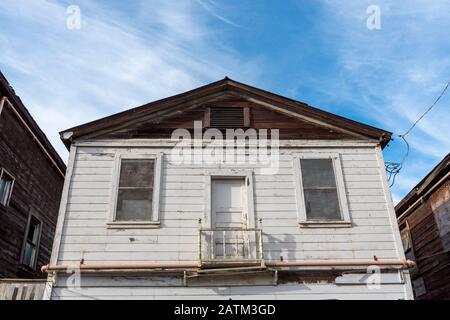 Walnut Grove, California, USA, January 12, 2020 - Abandoned House  on main street of Locke, an old chinse settlement in the Sacramento Delta Stock Photo