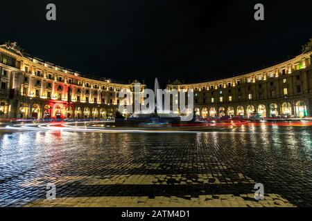 October 18,2019 Piazza della Repubblica, Rome Italy.lights reflection on the road after rain at night, Piazza della Repubblica is a semi-circular piaz Stock Photo