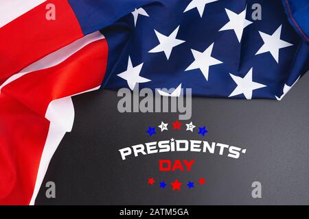 Happy Presidents' Day typography over black background with US American flag border Stock Photo