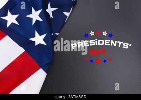 Happy Presidents' Day typography over black background with US American flag border Stock Photo