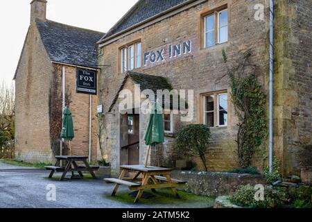 The Fox Inn in the winter frost. Broadwell, Costwolds, Gloucestershire, England Stock Photo