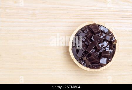 Grass jelly  (Mesona chinensis) or leaf jelly or herb jelly is a jelly-like dessert in East Asia and Southeast Asia. Created by using the Platostoma p Stock Photo