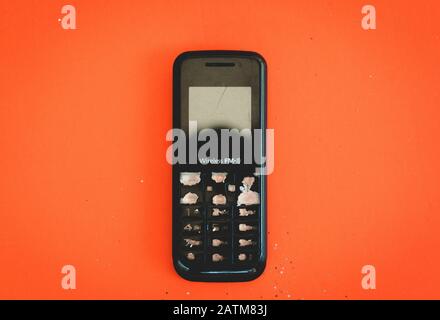 Old black feature phone showing its number keypad Stock Photo