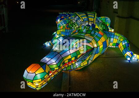 Sydney, Australia - June 11, 2016: Light sculpture of large crocodile at Taronga Zoo during annual Vivid Sydney light festival. Vivid Sydney at Tarong Stock Photo