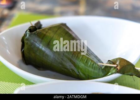 Steamed Banana leaf garlic rice, Philippines Stock Photo