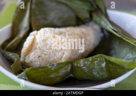 Steamed Banana leaf garlic rice, Philippines Stock Photo