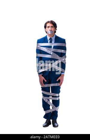 The tied employee with tape on mouth isolated on white Stock Photo