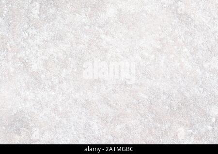 Rough white pale gray grainy natural sand stone texture and scratches background Stock Photo