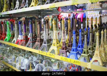 Souvenir shop in Paris, small Eiffel towers for sale Stock Photo