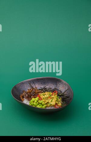 Japanese Food - teriyaki Chicken Karaage or Chicken Tatsutaage Curry Served with Rice topping with seaweed Stock Photo