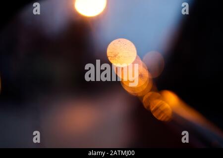 City traffic lights at night,  abstract blurry circles on black background Stock Photo