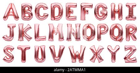 English alphabet made of rose golden inflatable helium balloons isolated on white. Gold pink foil balloon font, full alphabet set of upper case Stock Photo