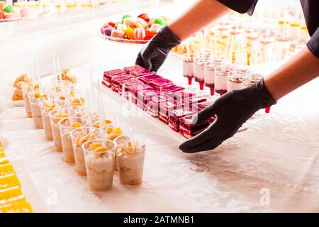 Buffet table with cakes and desserts. Wedding party. Stock Photo