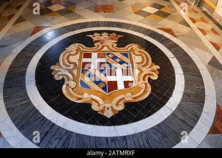Coat of arms on corridor mosaic marble floor of the Grandmaster Palace in Valletta, Malta, State Rooms, palace of the Grand Masters of the Order of St Stock Photo