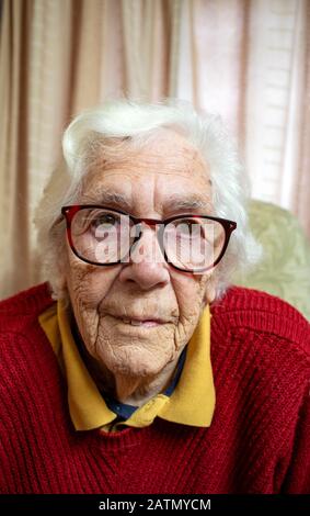 Woman suffering from age-related macular degeneration Stock Photo