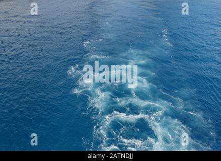 Ripples of water created by a ship's propeller Stock Photo