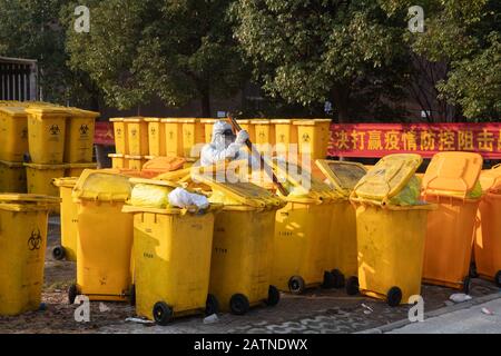 A Chinese medical worker processes medical wastes at Hankou Hospital in Wuhan City, central China's Hubei Province on February 4th, 2020. Stock Photo