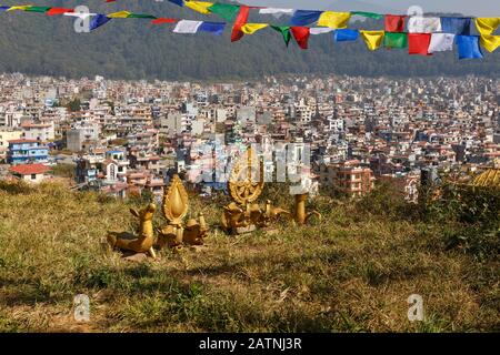 Buddhist symbols on a hill against the background of the city of Kathmandu, Nagarjun Nepal. Stock Photo