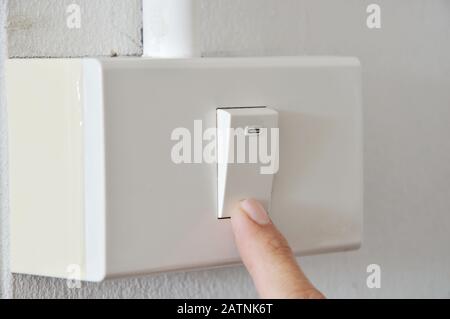 toggle switch in plastic box on the wall Stock Photo