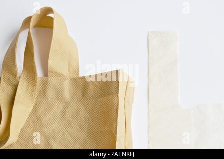 fabric and plastic bag optional for environment concern on white background Stock Photo