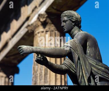 Statue of Apollo as an archer (Apollo Saettante). Bronze. Temple of Apollo. Copy (the original is preserved in the Archaeological Museum of Naples). Detail. Pompeii, La Campania, Italy. Stock Photo