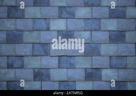 Abstract Multi Tone Colored Blue Grey Brick Wall, cold tones Stock Photo