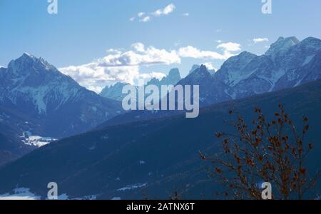Snow-capped peaks in the morning light Stock Photo