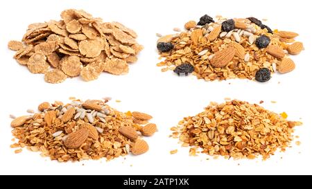 Collection of heaps of muesli, flakes and granola with raisins, seeds and nuts. Healthy eating concept Stock Photo