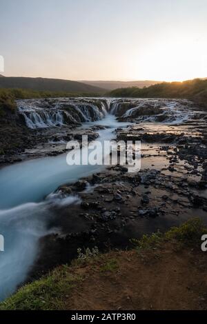 Long exposure of Bruarfoss waterfall before sunset Iceland June 2019 Stock Photo