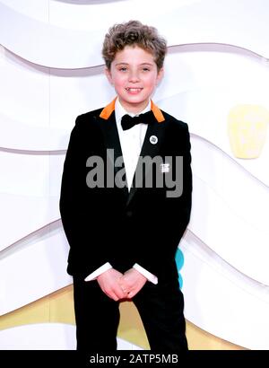 Roman Griffin Davis attending the 73rd British Academy Film Awards held at the Royal Albert Hall, London. Stock Photo