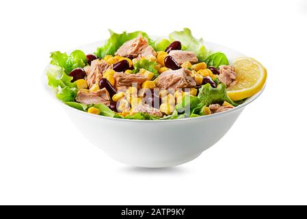 Healthy Green salad with tuna, corn and beans isolated on white background. Mexican corn salad. Stock Photo
