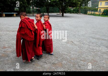 Young monks walking in a remote monastery in Kathmandu valley Stock Photo