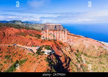 Viewpoint Mirador de Abrante with Skywalk, eroded mountain slope with red earth, near Agulo, drone photo, La Gomera, Canary Islands, Spain Stock Photo