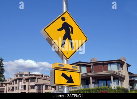 Pedestrian crossing. Marking in the form of traffic lights and a road sign. Stock Photo